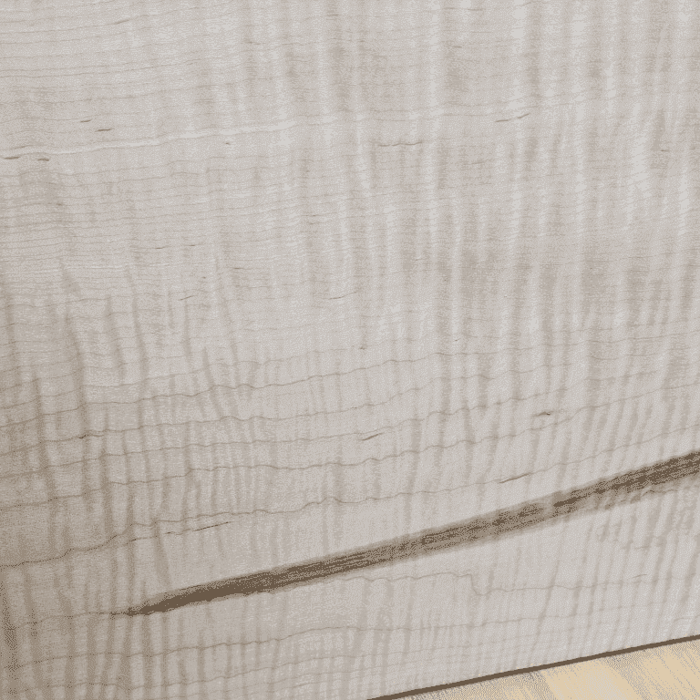 Close-up of a wooden surface with visible grain and texture